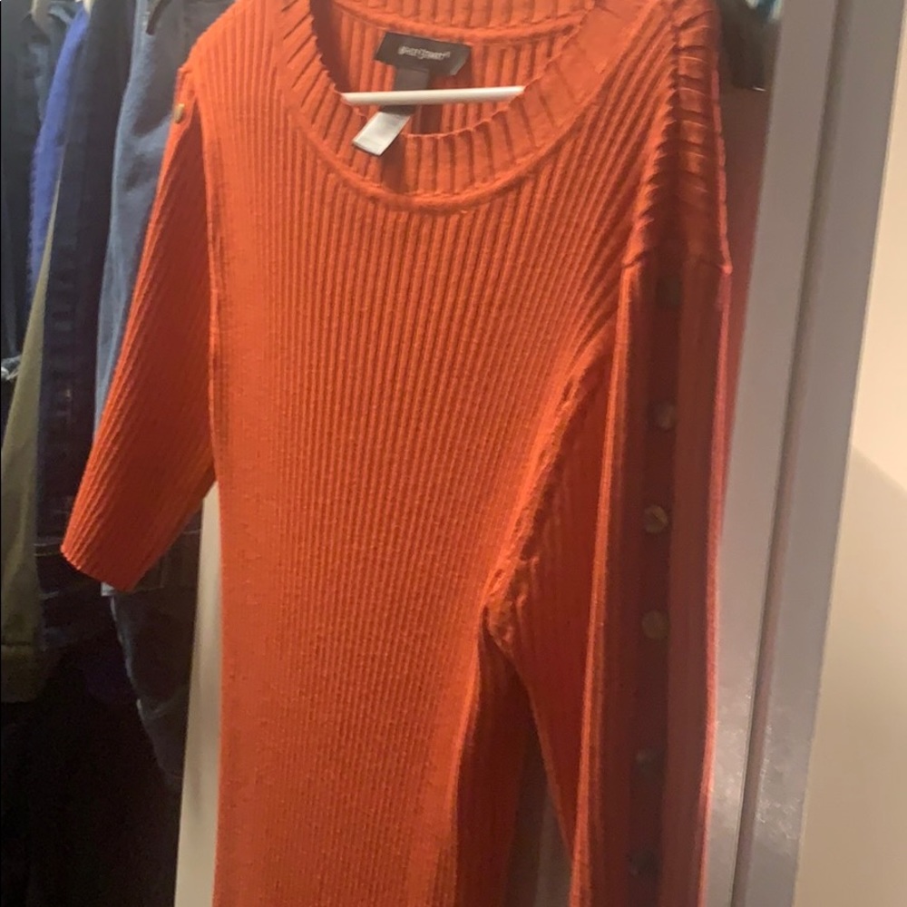 Burnt orange dress gold button detail on side